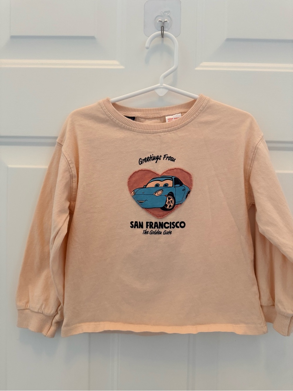Zara Peach Long-Sleeve Sweatshirt with Blue Car Graphic